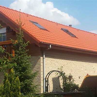Moerzeke: coating dak in tegelrood - Marco Kachelservice
