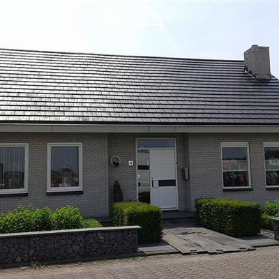Wouw (NL): dak reinigen en coaten - Marco Kachelservice